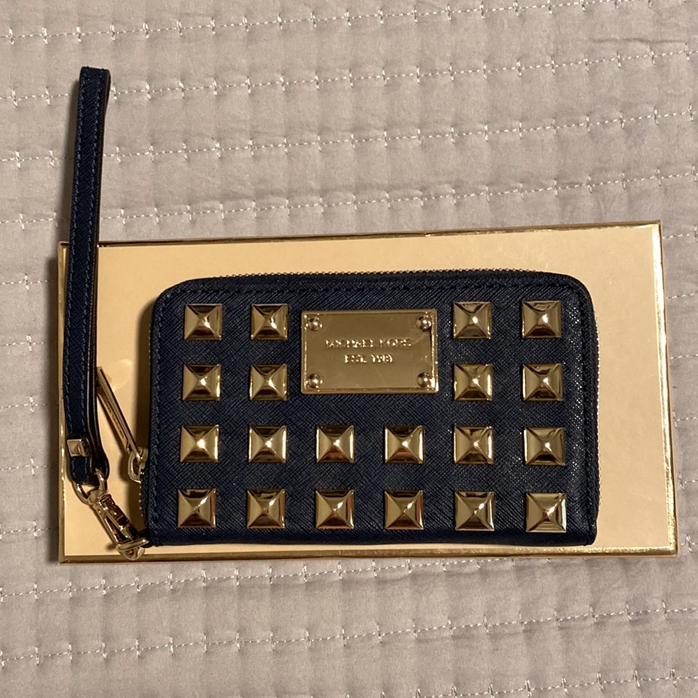Michael Kors Navy wristlet with gold accents